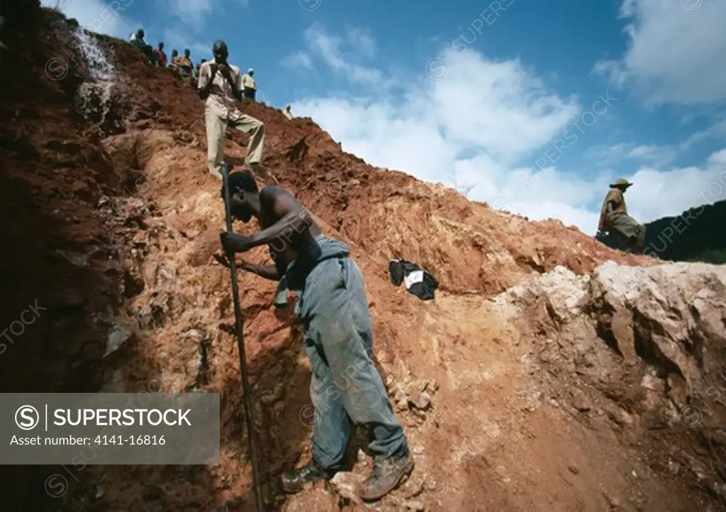 gold miner at work at strip mine manica, mozambique, south eastern africa 
