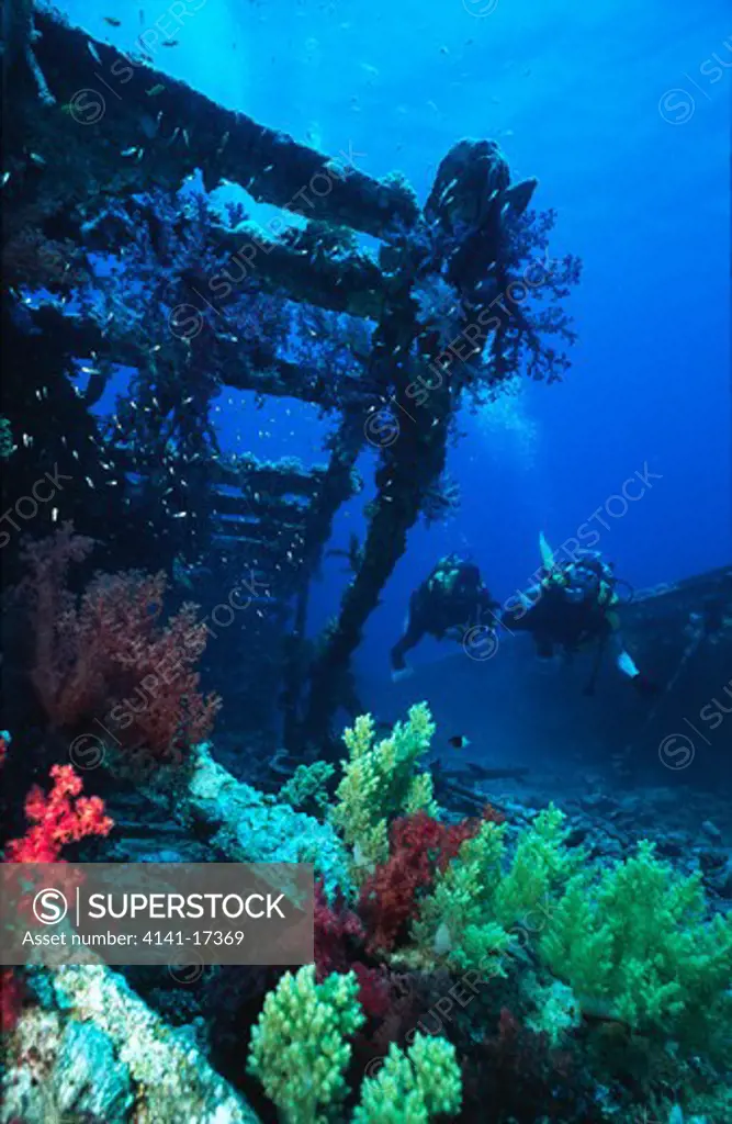 bluff point barge wreck overgrown with corals strait of gubal, gulf of suez, red sea, egypt. 