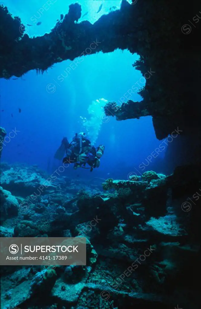 diver at wreck of sarah h gulf of suez, red sea, egypt.
