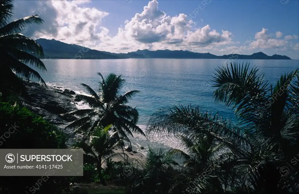 beach and palm trees mahe, seychelles.