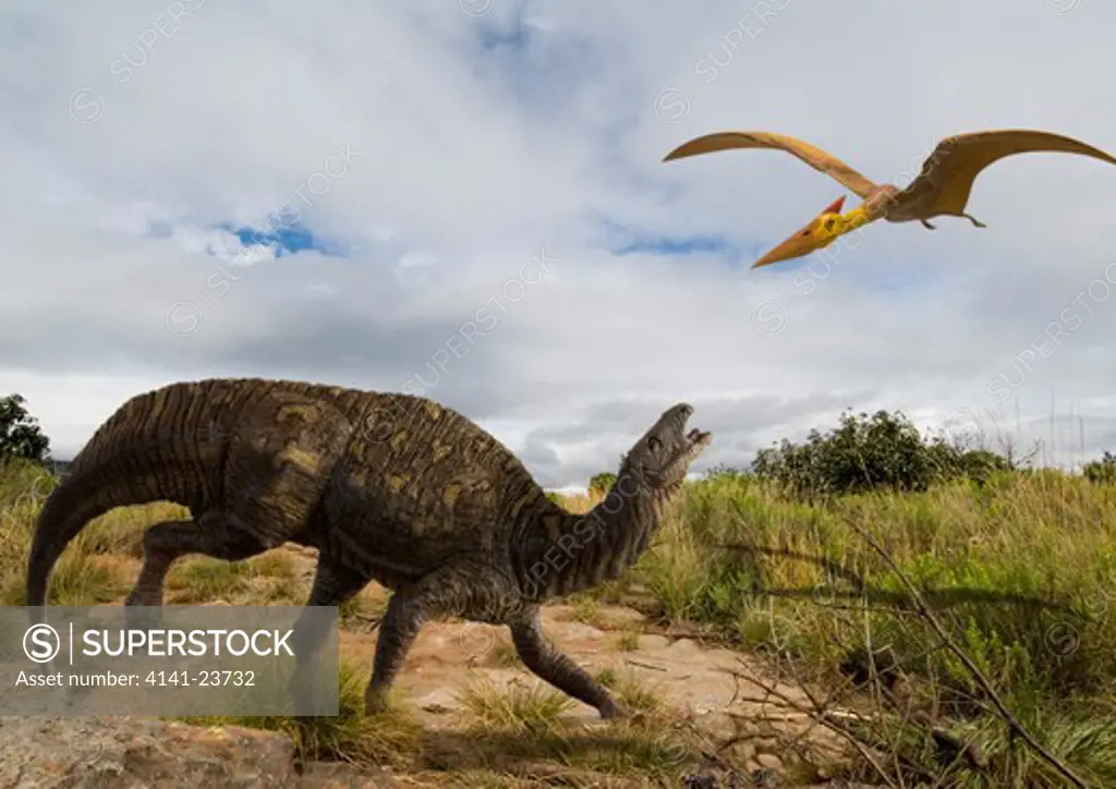 digital composite of an adult tenontosaurus tillettorum - an plant-eating hypsilophodontid dinosaur from the early cretaceous period - startled by a passing pterosaur in what is today western north america.