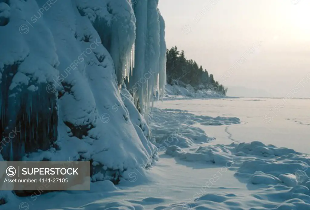 lake baikal winter with heavily iced cliffs siberia, russia