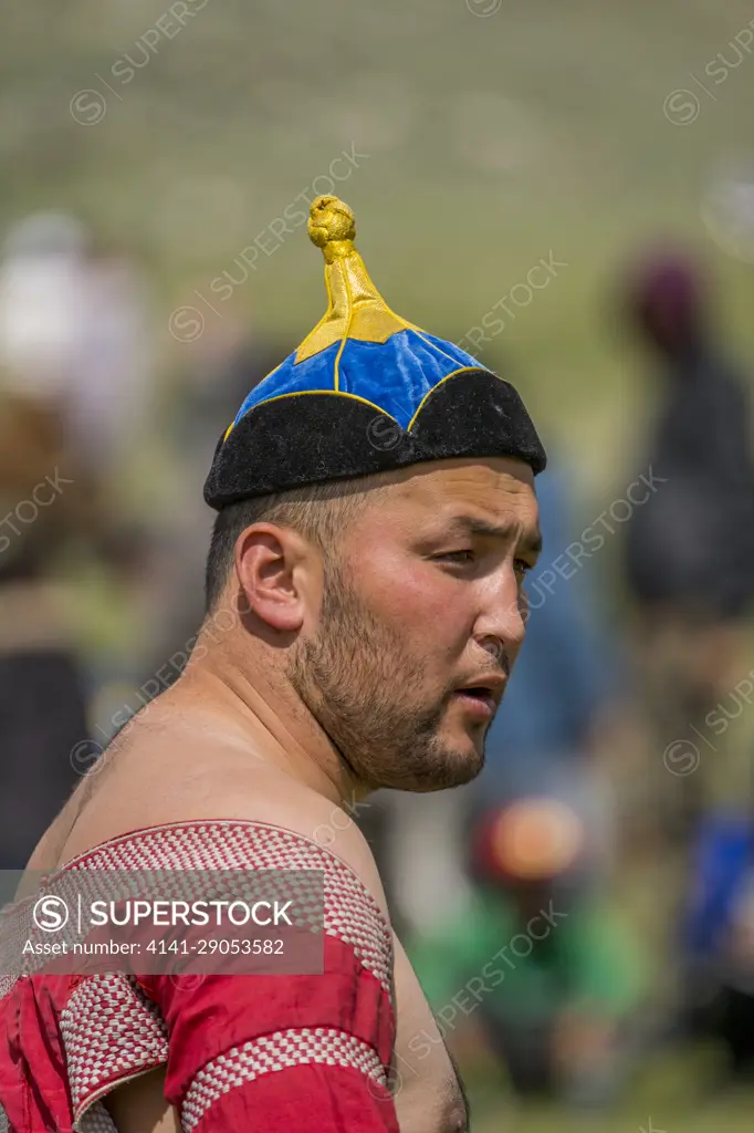 Portrait of an Mongolian wrestler at a local Naadam Festival in the Sagsai River valley, a remote valley in the Altai Mountains (Altay Mountains) near Altai Sum about 200 kilometers from Ulgii (լgii) in the Bayan-Ulgii Province in western Mongolia.