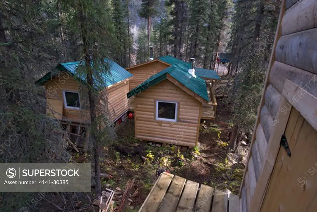 small cabins serve as accomodations for remote bear-viewing operation. yukon territory, canada.