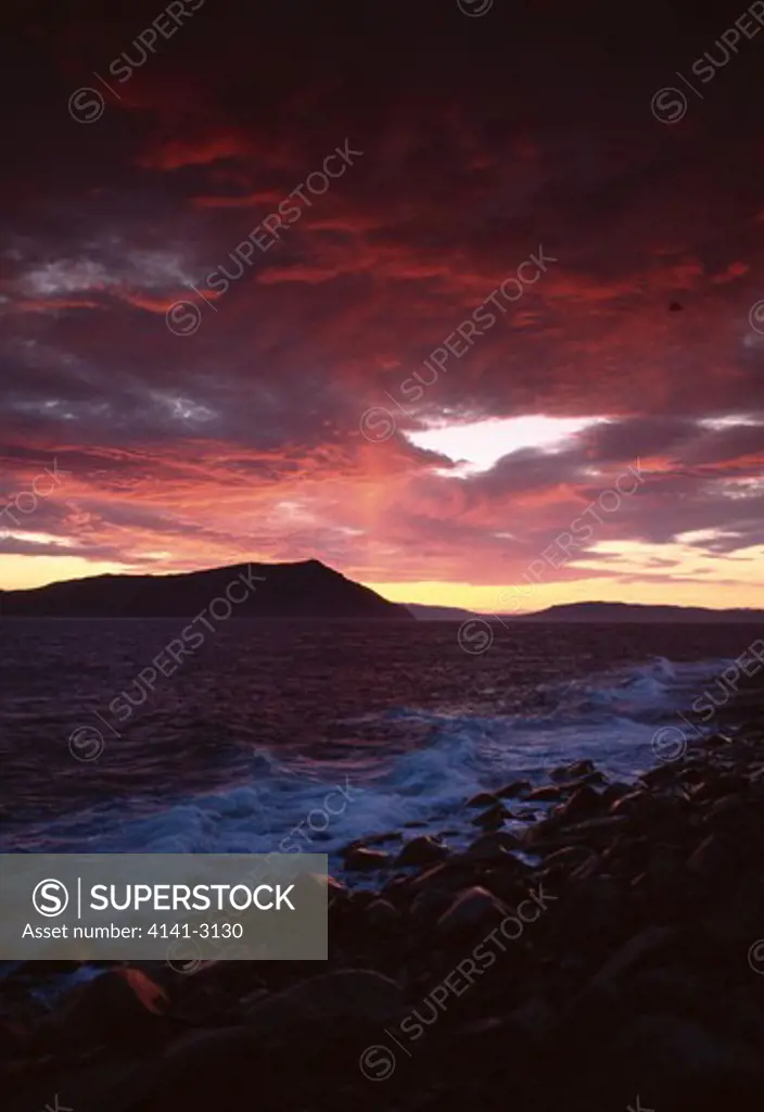 talan island northern coastline & midnight sunset near magadan, sea of okhotsk, siberia, russia july major seabird breeding island