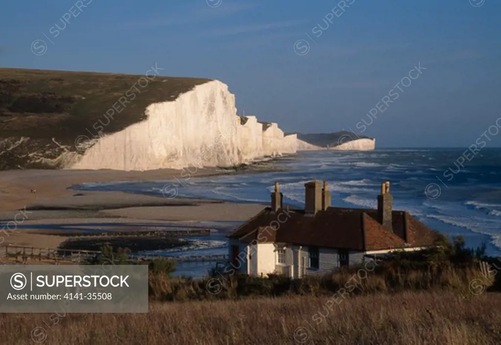 seven sisters chalk cliffs view eastwards with fishermen's cottages cuckmere haven, east sussex southern england. september 
