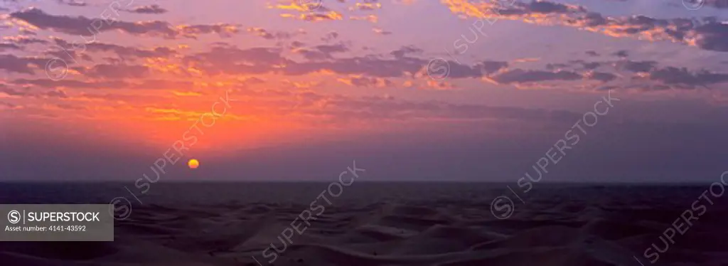 sand dunes in the rub al-khali at sunset, united arab emirates, arabian peninsula, march