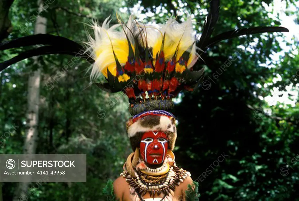 melpa tribesman with headdress,, face painting & necklaces, papua new guinea, 