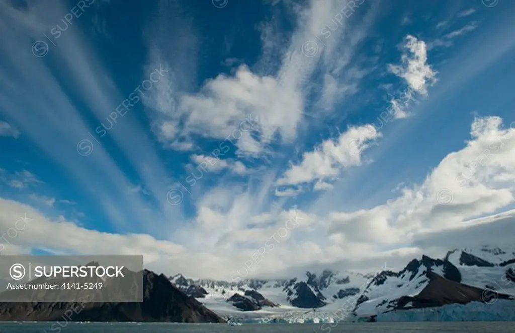 clouds above weddell glacier, gold harbor, south georgia island.