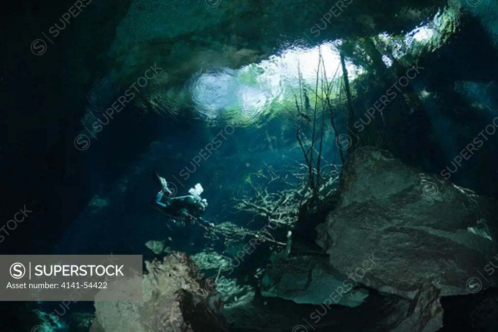 Cave Diver In Chac Mool Cenote, Playa Del Carmen, Yucatan Peninsula, Mexico