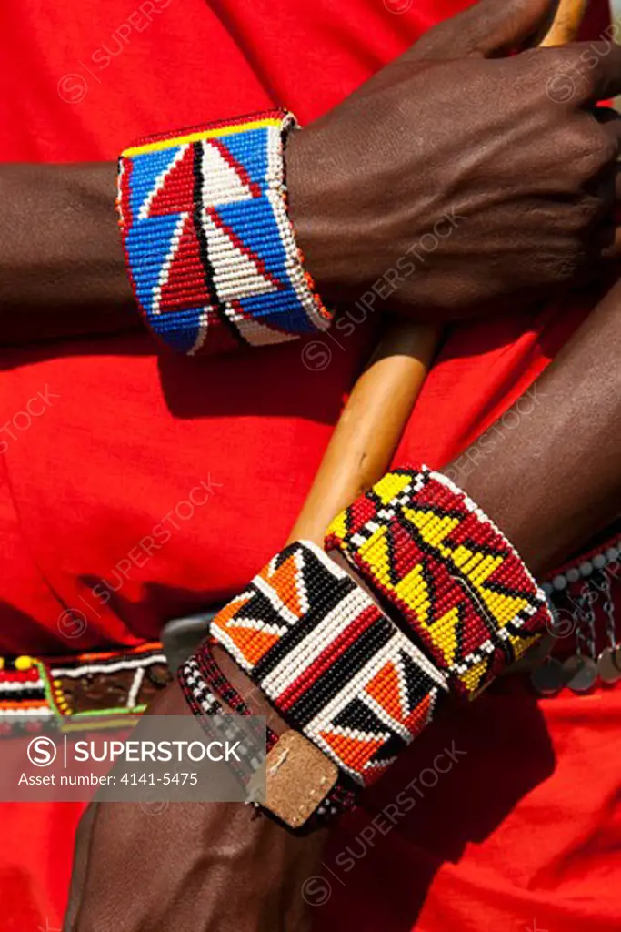 beaded braclets worn by masai warrior, a moran, kenya.