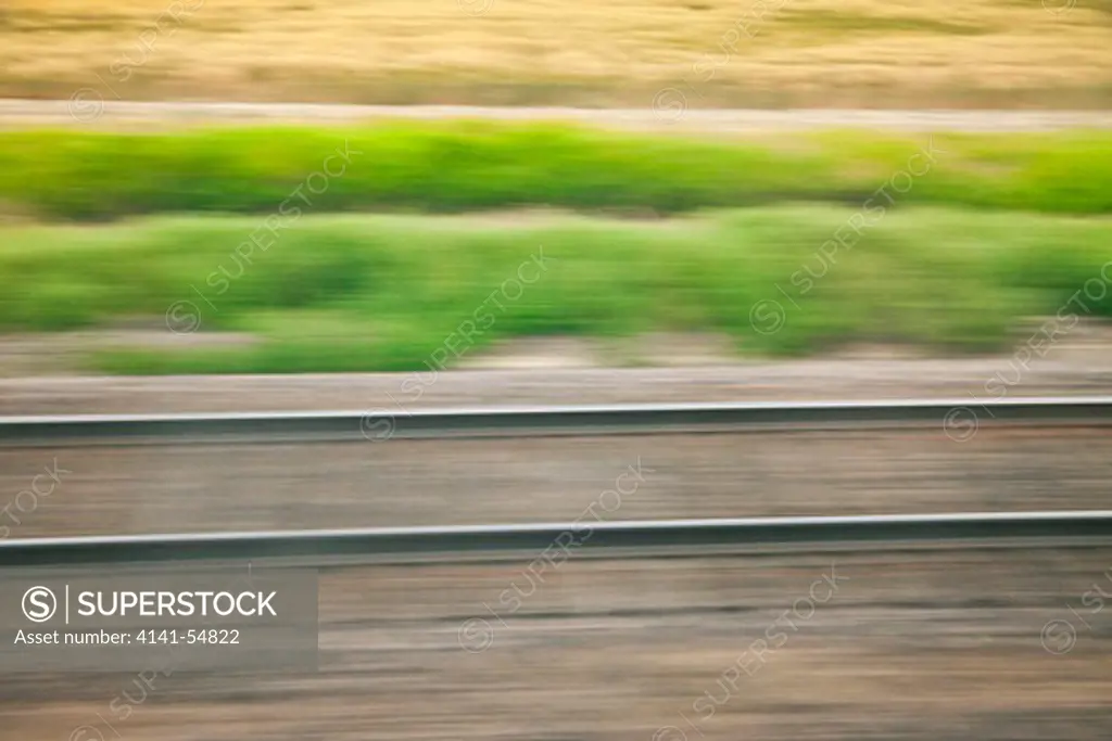 Motion Of Rails And The Passing Landscape Near The Tracks, Viewed From The Amtrak Empire Builder In Montana, Usa, Empire_Builder-276