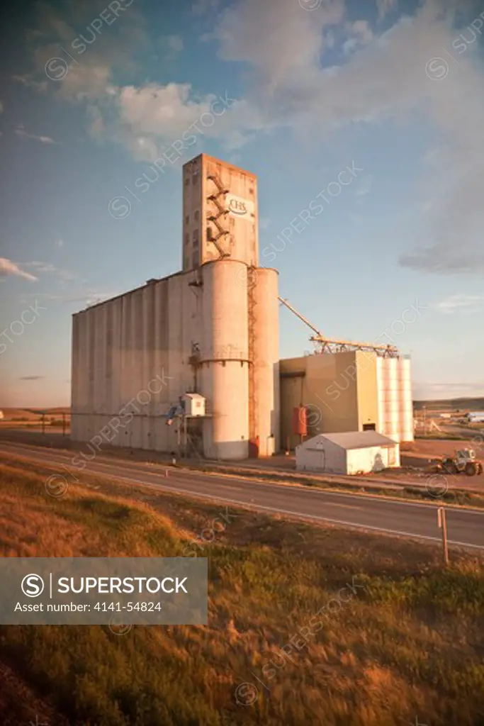 Big Concrete Grain Elevator In Montana, Viewed From The Amtrak Empire Builder In Late Afternoon Sunlight, Usa, Empire_Builder-298  Note: Not Property Released; Editorial Use Only