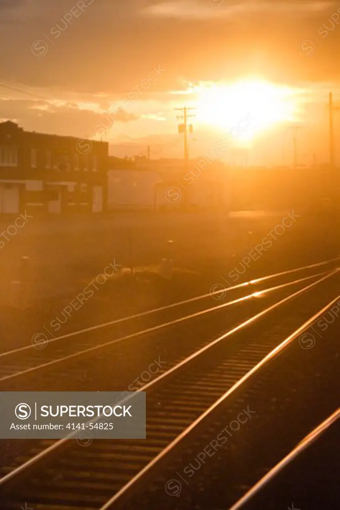 Railroad Tracks In Light Of Sunset, Viewed From The Amtrak Empire Builder In Montana, Usa, Empire_Builder-299