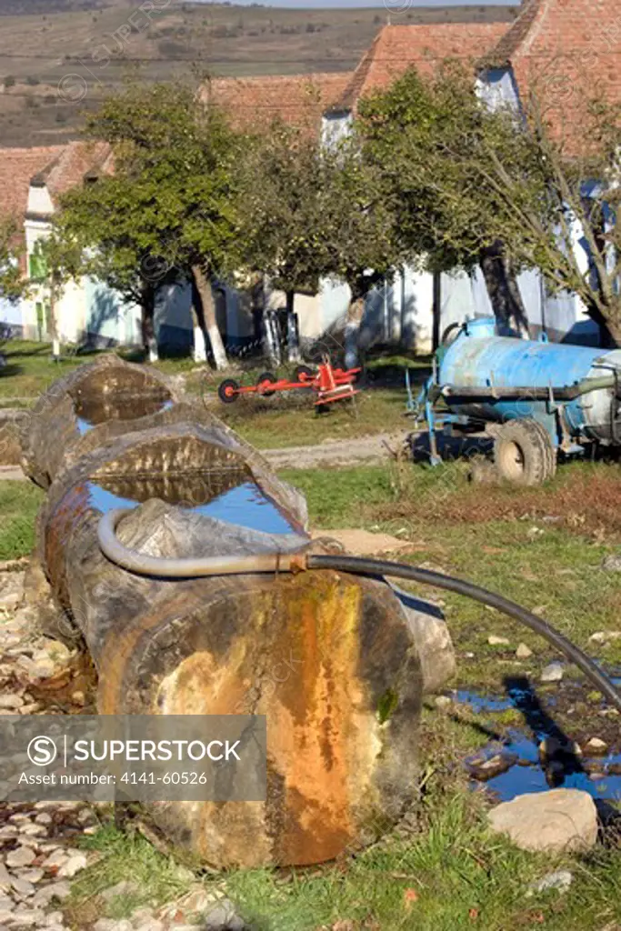 Water Butt Made Out Of An Oak Tree, Sustainable Use Of Natural Resources In Peasant Community, Saxon Part Of Transylvania, Romania