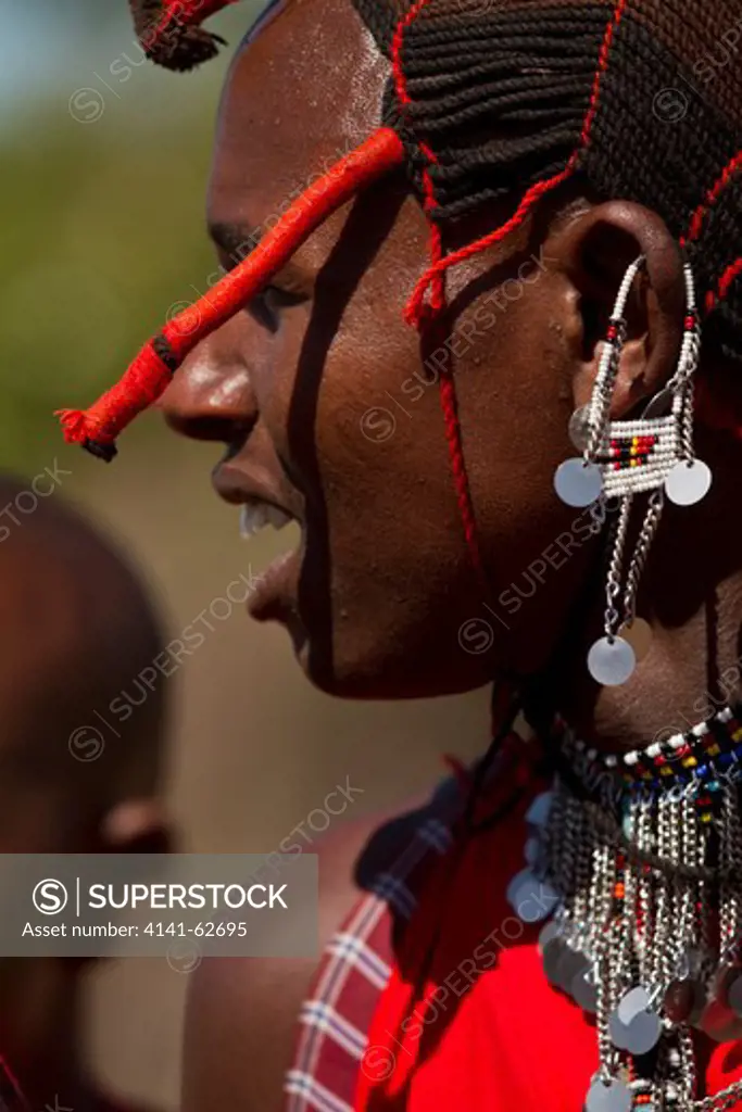 Masai Woman During Dancing Ceremony, Detail Of Jewelry, In Upper Mara, Masai Mara Game Reserve, Kenya