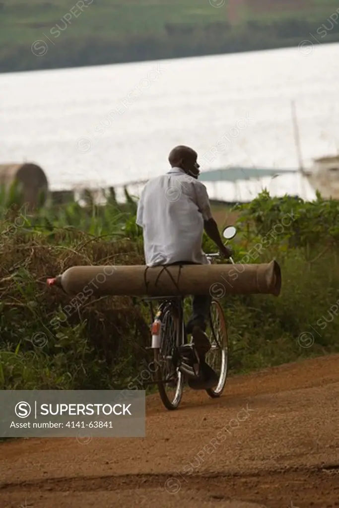 Transport Bicycle  Compressed Gas Cylinder Being Carried On The Carrier Of A Bike Jinja