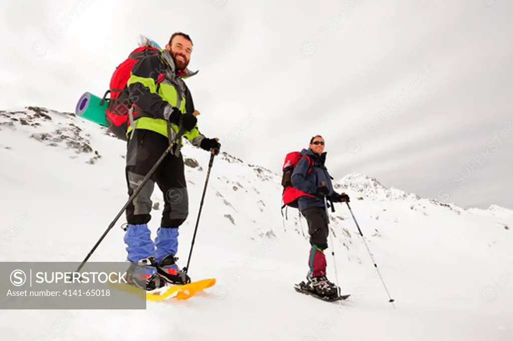 Mountaineers In Snow Shoes, High Pyrenees Natural Park. Lleida, Spain.