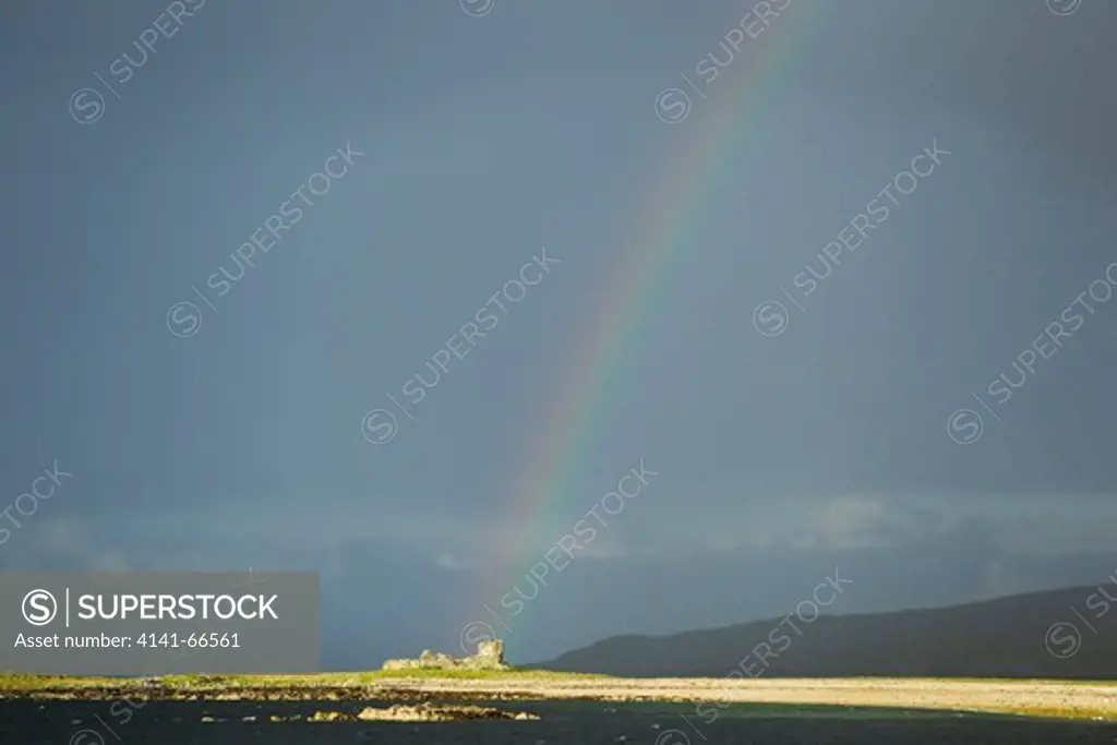 Rainbow over abandoned croft Fetlar, Shetland, UK LA005788
