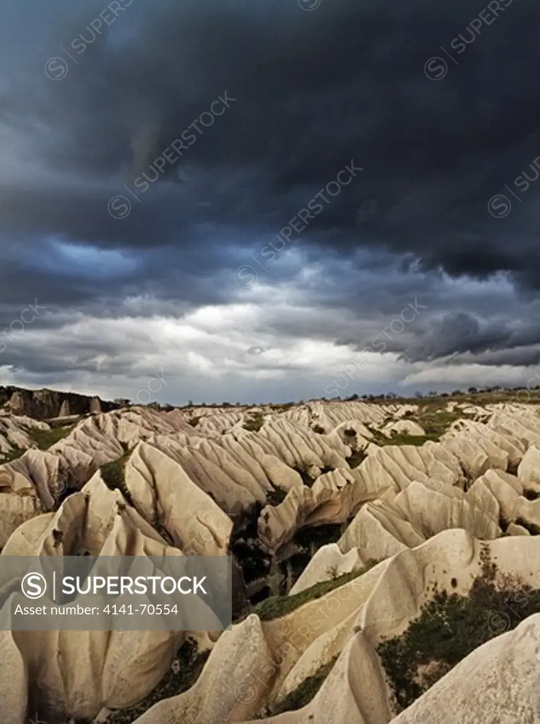 Stormclouds are forming over Rose Valley in Cappadocia, Turkey.