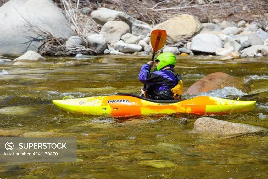 Kayaking the East Branch of the Pemigewasset River in Lincoln, New Hampshire USA during the spring months