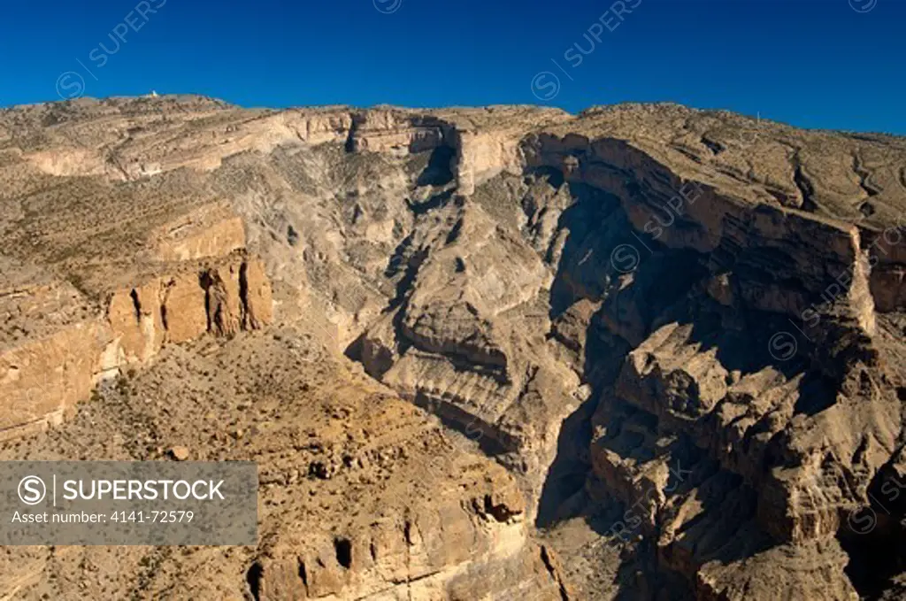 View from the visitors platform at Mt Jebel Shams into the Grand Canyon of Oman, Al Hajar Mountains, Sultanate of Oman