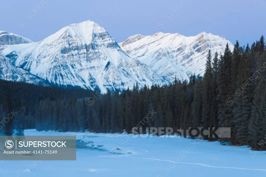 The Athabaska River on a cold winter morning; Jasper National Park, Alberta, Canada.
