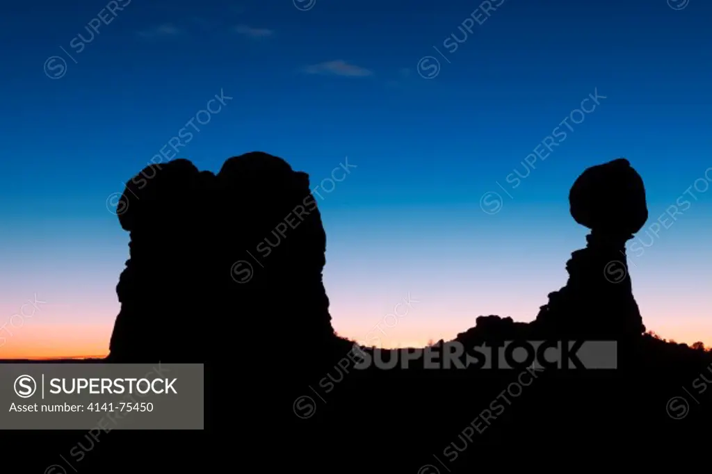 Balanced Rock silhouetted against the twilight sky; Arches National Park, Utah.