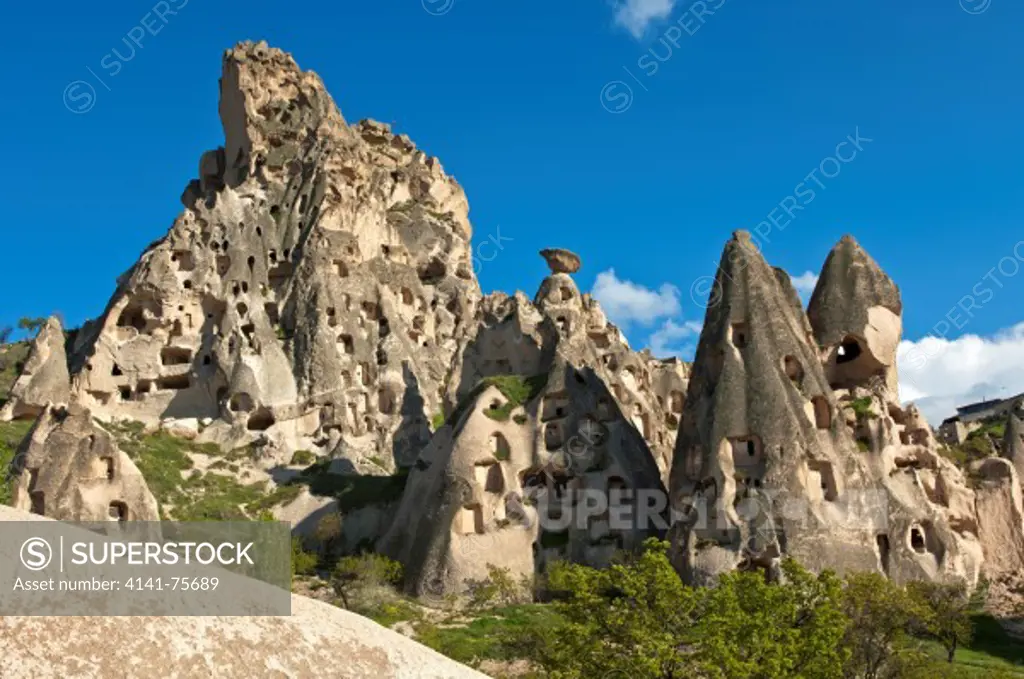 Hollowed tuff rock with storage facilities and dwellings, UNESCO World Heritage site Garamba National Park and the Rock Sites of Cappadocia, Uchisar, Turkey