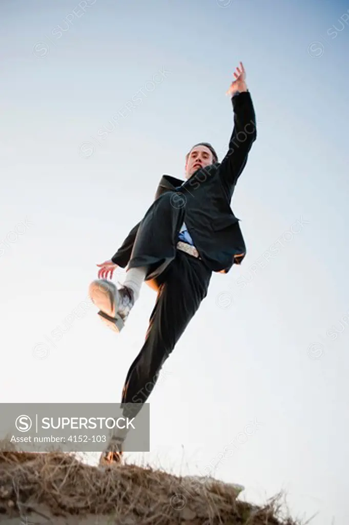 Low angle view of a businessman running