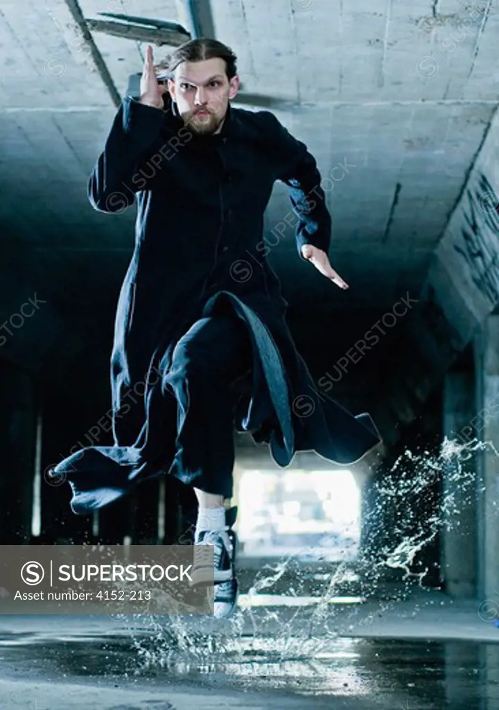 Man running in a tunnel