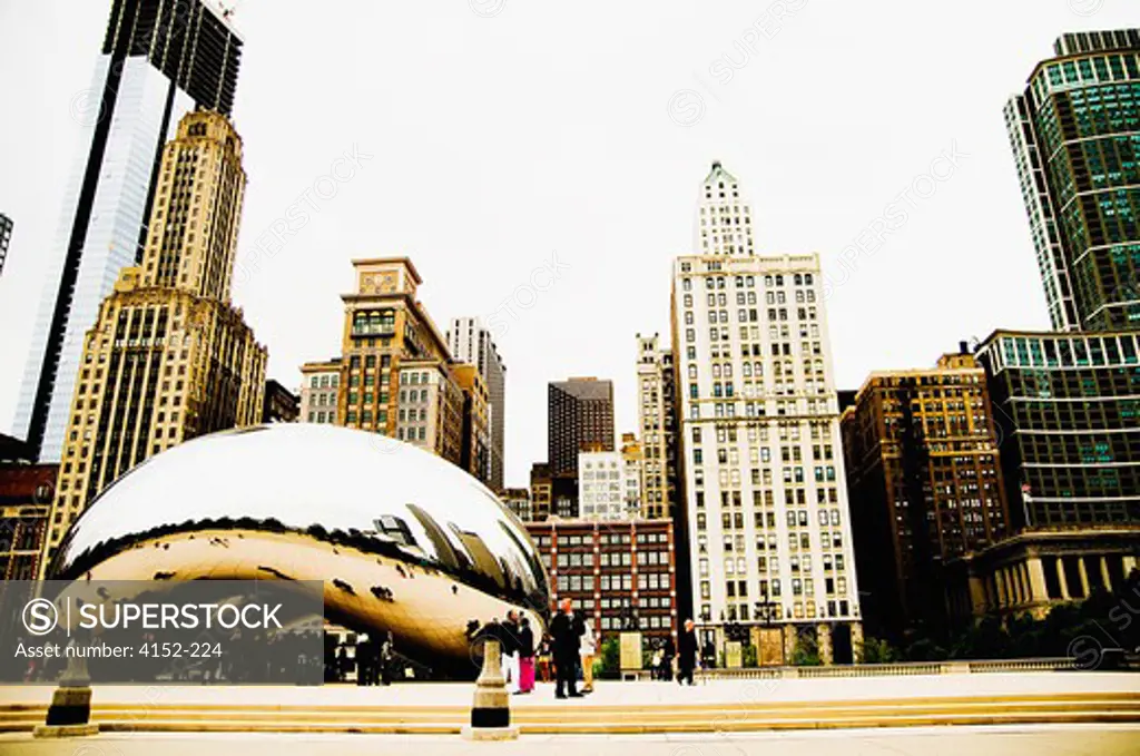 Sculptures in front of buildings in a city, Cloud Gate, Millennium Park, Chicago, Illinois, USA