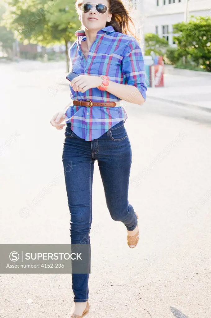 Woman running on a street