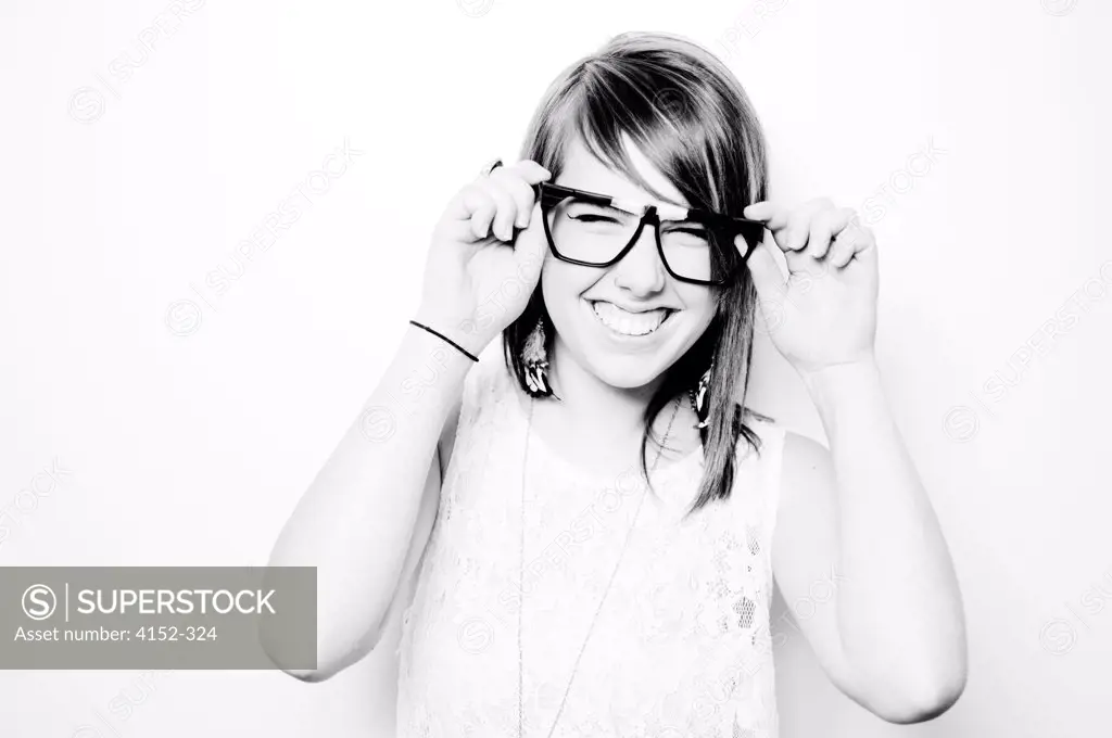 Portrait of young girl in spectacles smiling