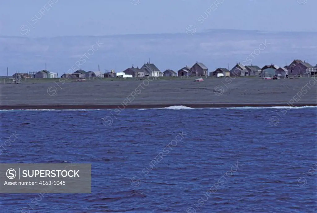 USA, ALASKA, ST. LAWRENCE ISLAND, INUIT VILLAGE OF GAMBELL FROM THE SEA