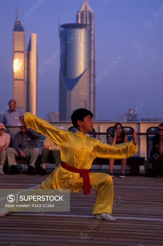CHINA, SHANGHAI, MS CLIPPER ODYSSEY, YOUNG BOY PREFORMING MARTIAL ARTS