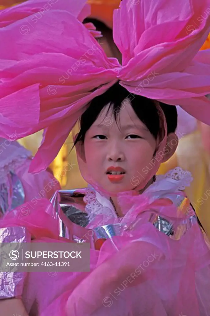 CHINA, SHANTOU, ELEMENTARY SCHOOL, GIRL DRESSED IN COSTUME FOR DANCE PERFORMANCE