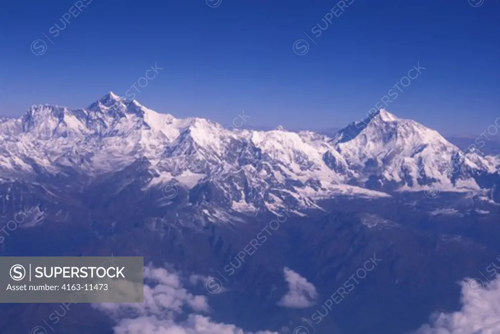 NEPAL, AERIAL VIEW OF HIMALAYA MOUNTAINS, MT. EVEREST ON LEFT (ELEVATION 29,028 FT), MT. MAKALU ON RIGHT (27,765 FT)