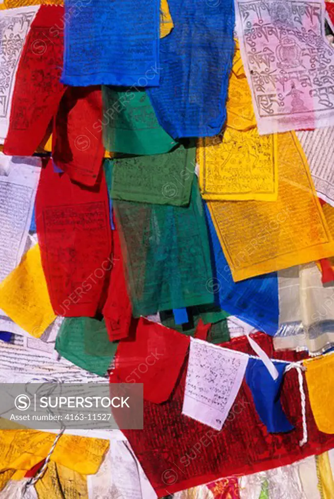 CHINA, TIBET, LHASA, JOKHANG TEMPLE, PRAYER FLAGS