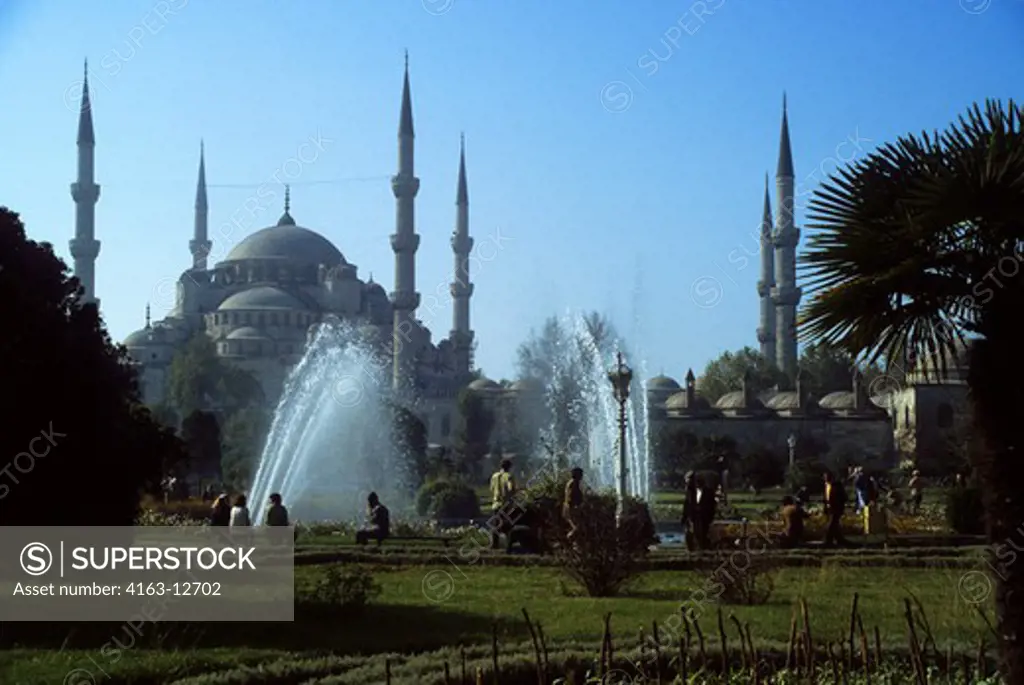 TURKEY, ISTANBUL, PARK WITH BLUE MOSQUE BACKGROUND