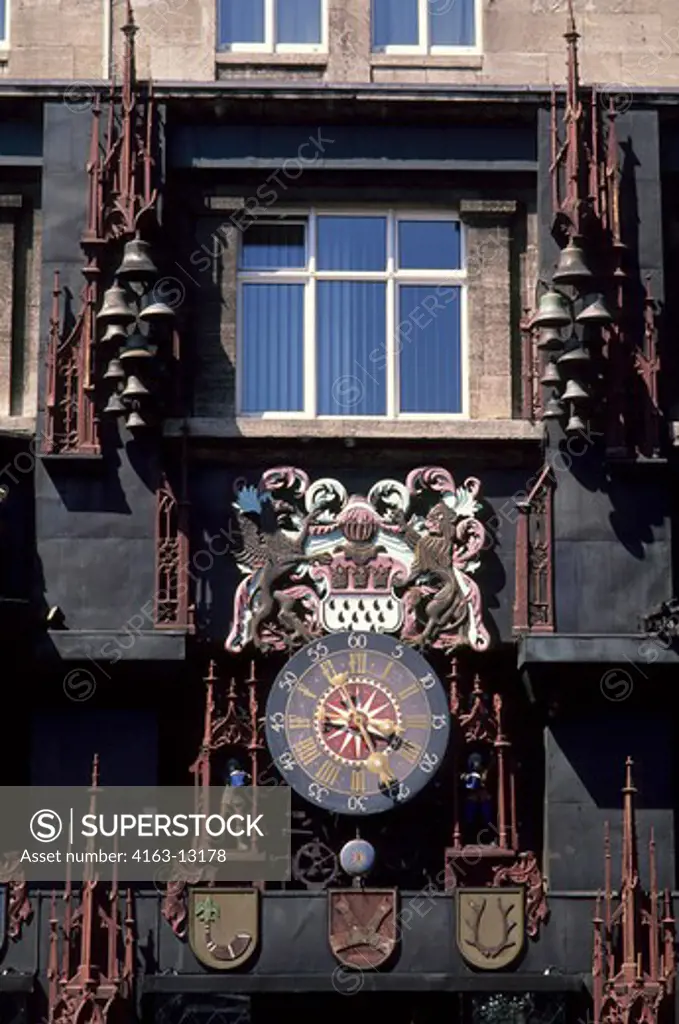 GERMANY, COLOGNE, DETAIL OF HOUSE WITH OLD CLOCK