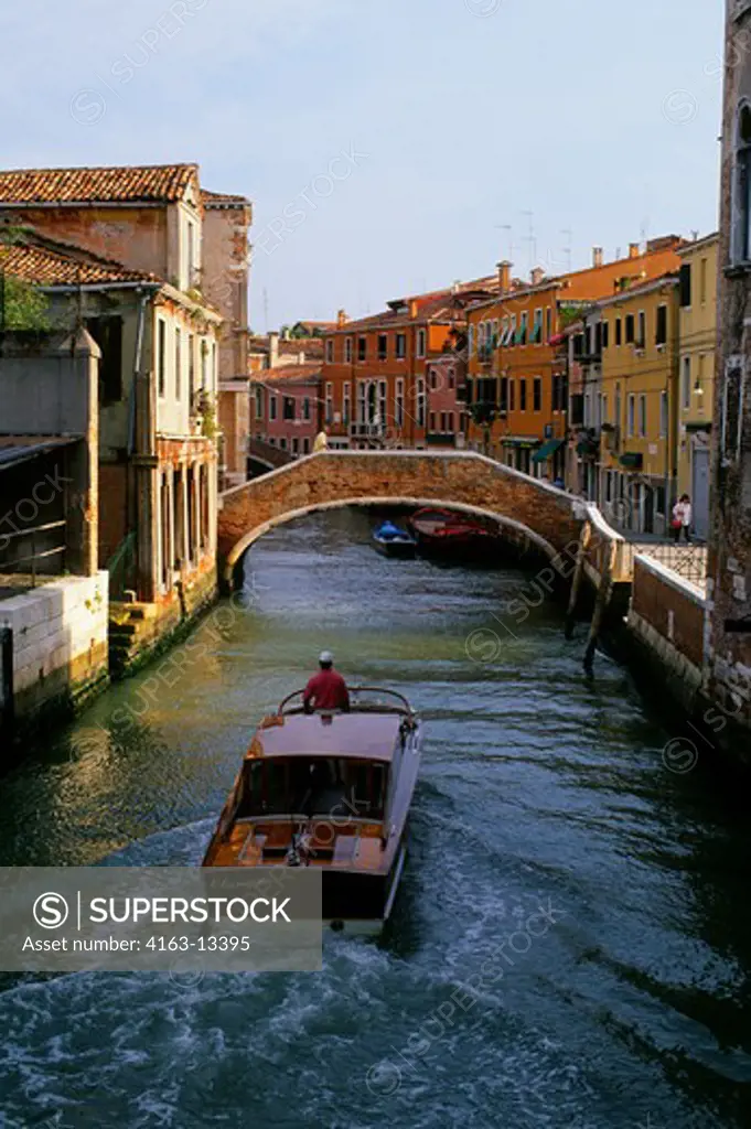 ITALY, VENICE, CANAL WITH WATER TAXI