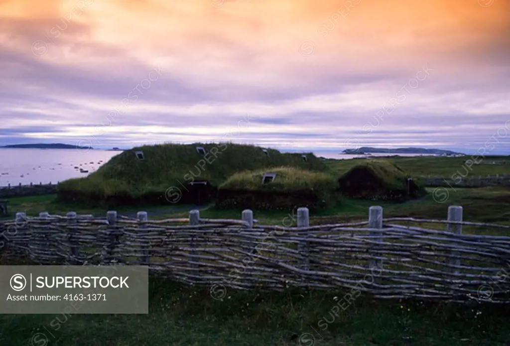 CANADA, NEWFOUNDLAND, L'ANSE AUX MEADOWS NHP, REPLICAS OF NORSE HOUSES FROM 1000 YEARS AGO