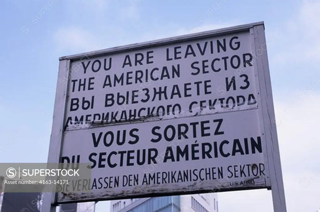 GERMANY, BERLIN,CHECKPOINT CHARLIE, MULTI-LINGUAL SIGN: RUSSIAN,GERMAN,FRENCH, ENGLISH