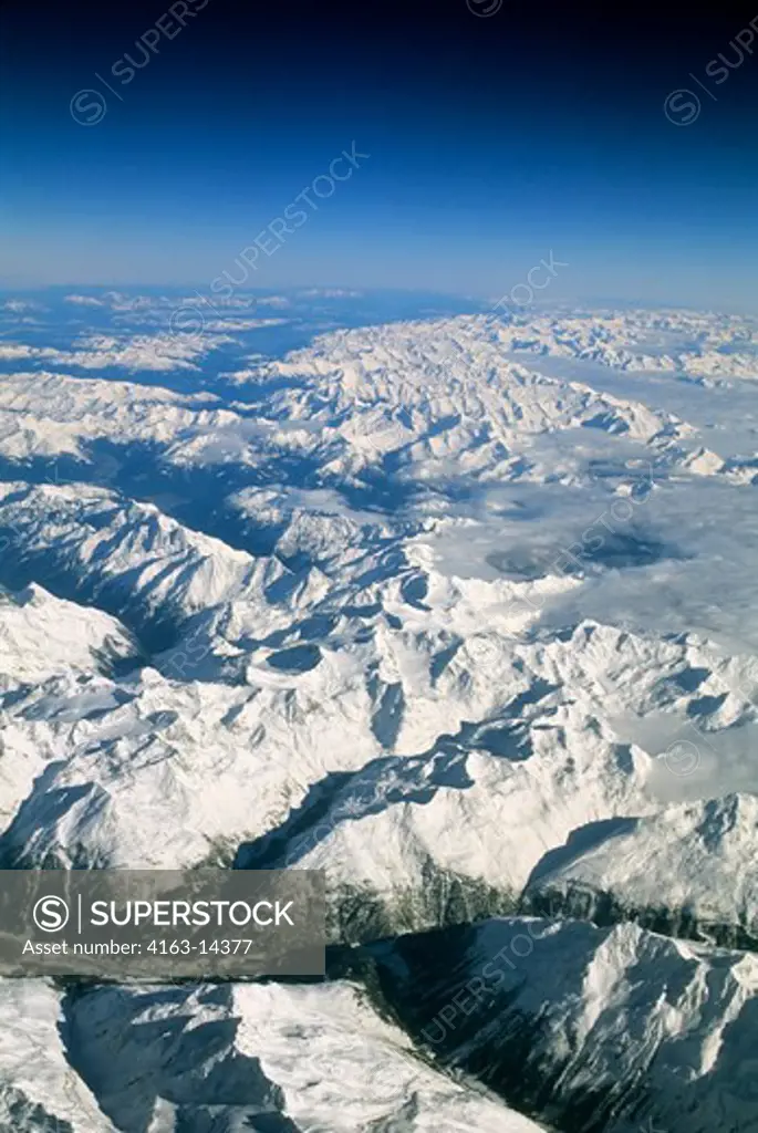 SWITZERLAND, AERIAL VIEW OF ALPS IN WINTER