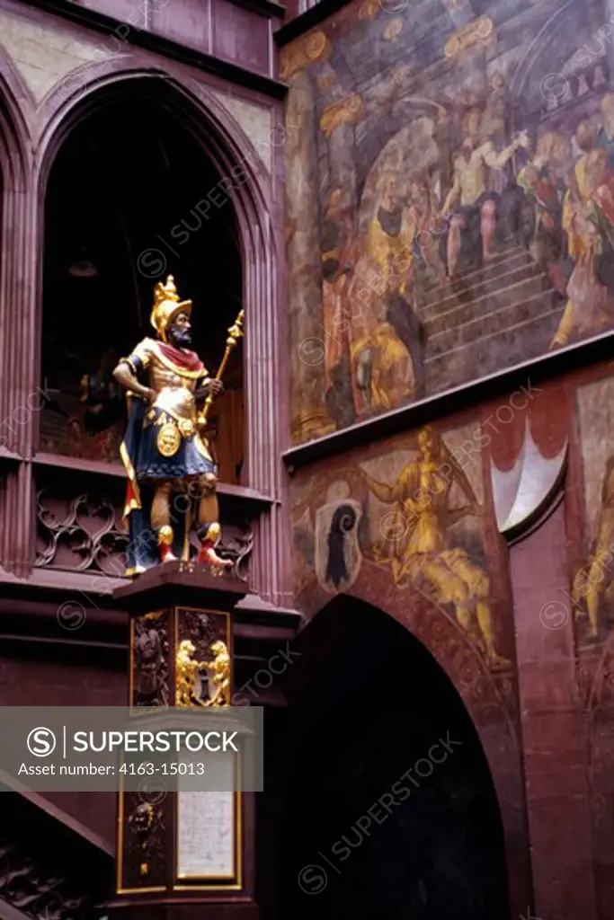 SWITZERLAND, BASEL, TOWN HALL, DETAIL OF PAINTED MURALS IN COURTYARD, STATUE