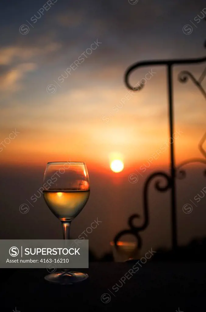 ALBANIA, SARANDA, WINE GLASS IN SUNSET