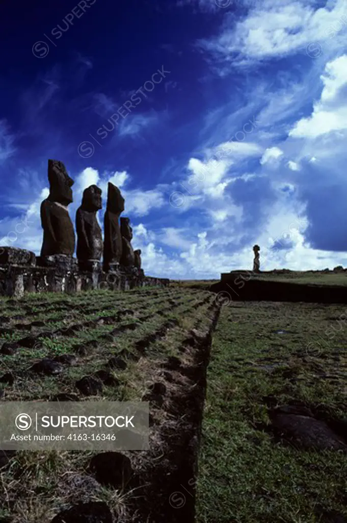 EASTER ISLAND, MOAIS AT AHU TAHAI WITH DRAMATIC CLOUDS