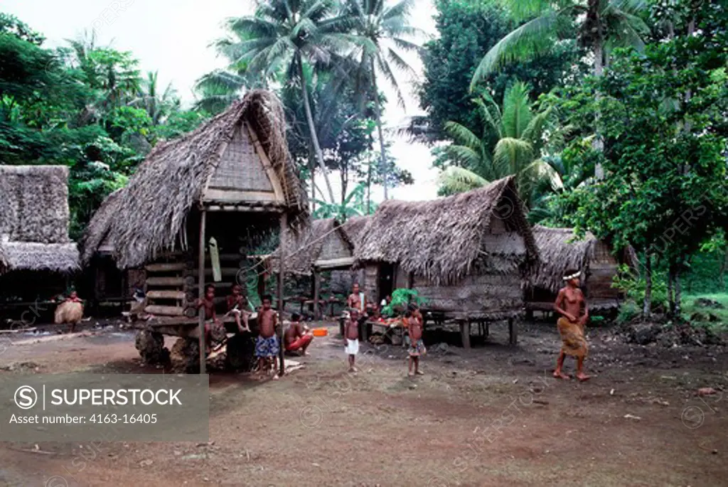 PAPUA NEW GUINEA,TROBRIAND ISLANDS, KIRIWINA ISL., KAIBOLA VILLAGE TRADITIONAL HUTS & YAM HOUSES