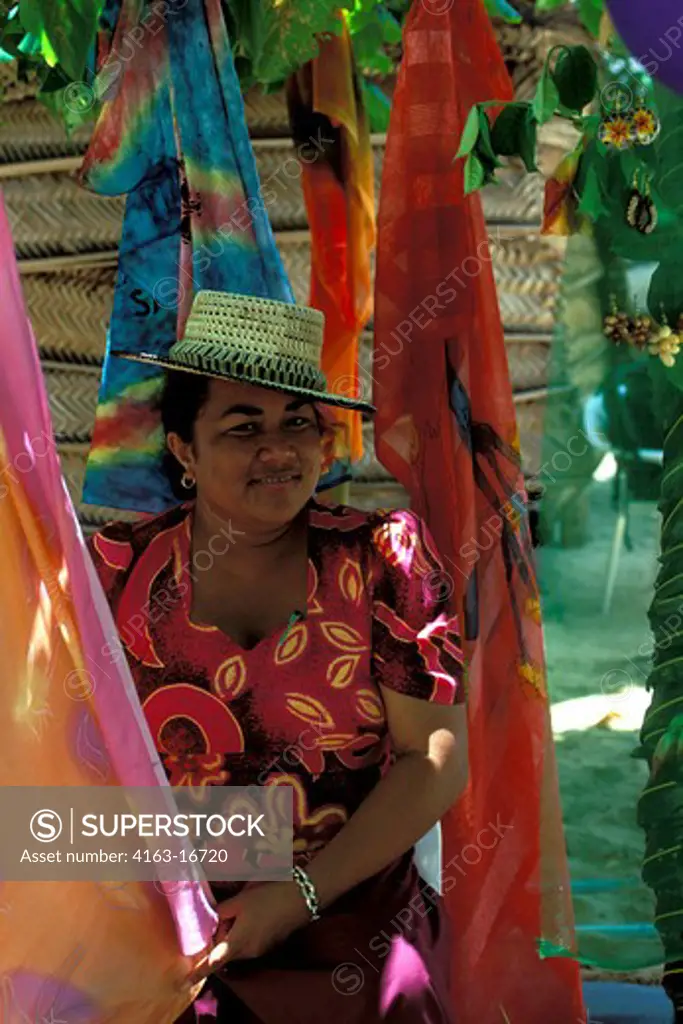 WESTERN SAMOA, SAVAI'I ISLAND, BEACH, COLORFUL PAREOS (BATIK) SARONGS, LOCAL WOMAN